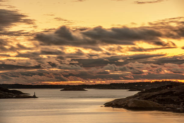 istock Magical orange golden sunset over an archipelago.. 1281136237