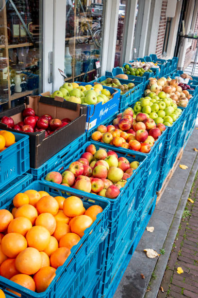 istock Fresh fruit and vegetables displayed in front of the grocery store 1281138170