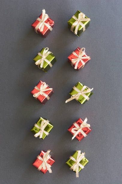 istock Christmas gifts with glowing lights. Shown from above. 1281139219