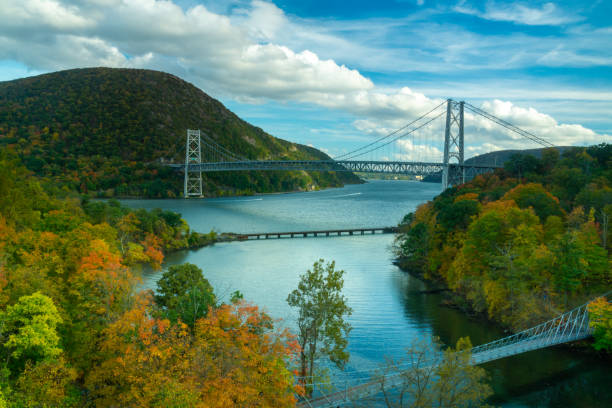 A wide angle view of the iconic Bear Mountain Bridge Fort Montgomery, NY / USA -Oct. 18, 2020: a wide angle view of the iconic Bear Mountain Bridge spanning the Hudson River. hudson valley stock pictures, royalty-free photos & images