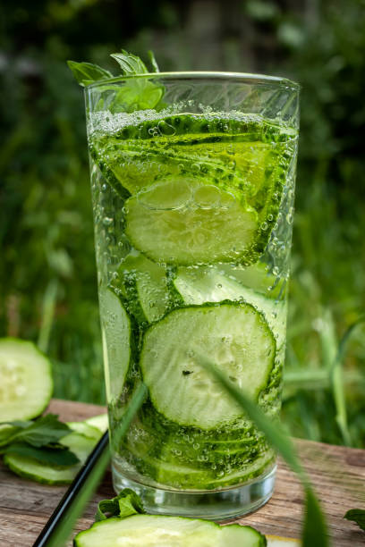 istock A cool, refreshing drink with cucumbers on nature on a hot day 1281139817