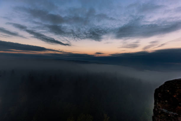 istock Moving clouds and autumn fog over the Black Forest 1281140484