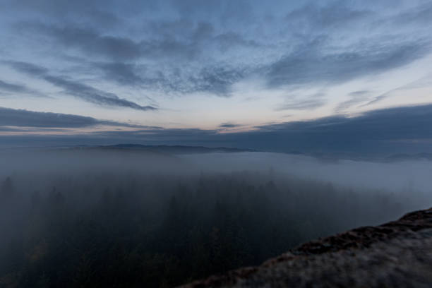 istock Moving clouds and autumn fog over the Black Forest 1281140897
