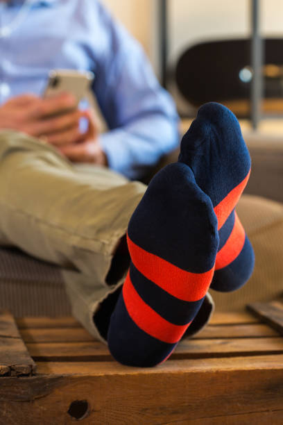 istock Young millennial businessman, freelancer working from home on the couch 1281141129