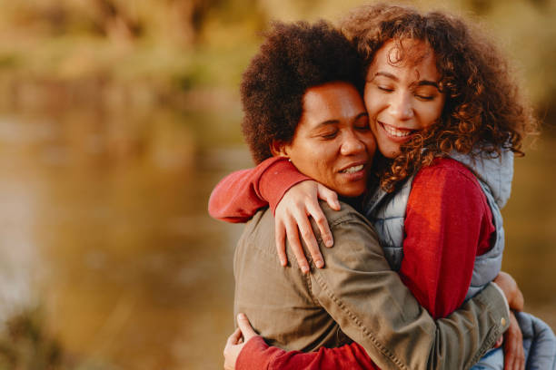 istock Mother embracing her daughter 1281146284