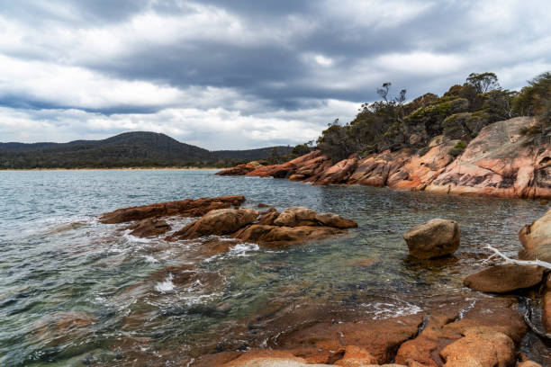 Honeymoon Bay, Freycinet National Park at Freycinet Peninsula Tasmania, Australia Tasmania, Australia. honeymoon bay stock pictures, royalty-free photos & images