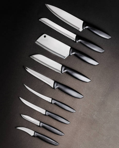 istock Kitchen knives set isolated and organized on a neutral background 1281148725