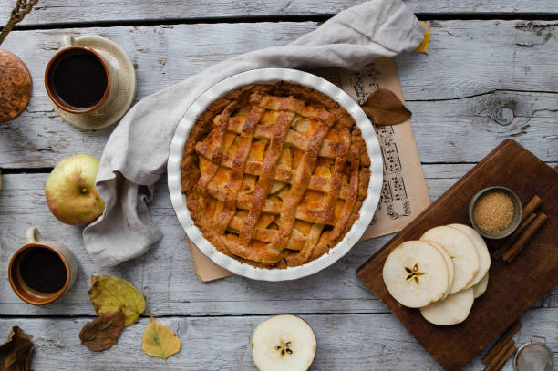 Lattice top apple pie on wooden crate.