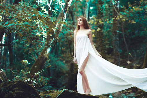 Fantasy woman portrait in forest