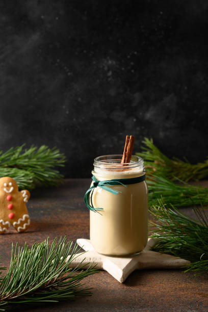 istock Christmas eggnog with gingerbread and cinnamon. Close up. 1281150304