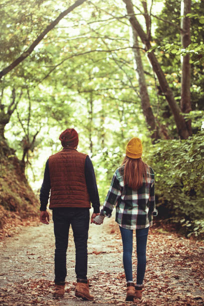 istock young lovers hiking in the forest 1281152478