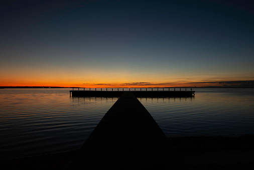 The pier at Osprey Park right before sunrise at Osprey Park in Mastic Beach, Suffolk County,, Long Island NY.