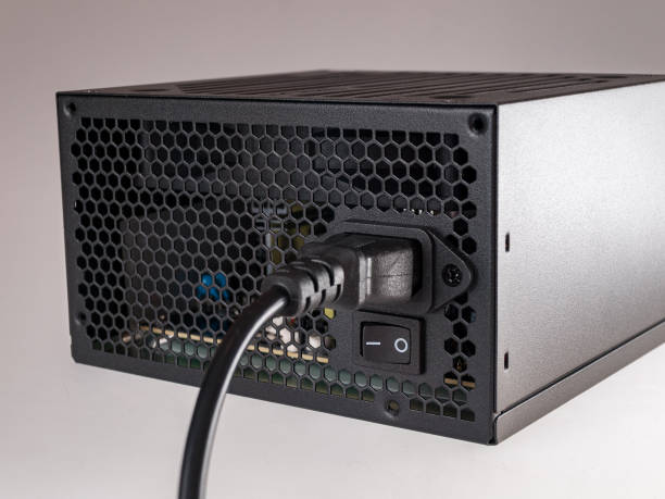 istock Computer part for system unit assembly, power supply for computer close-up, choice of quiet silent reliable power supply 1281160823