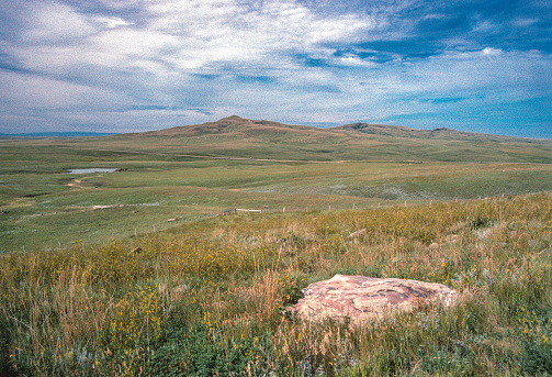 Rock formation on the Wyoming prairie in ranch country of western USA.