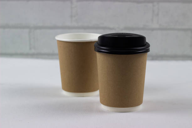 istock Brown coffee mock up on blank background for design any ideas. Paper mug cup template for cafe or restaurant create identity set. 1281167271