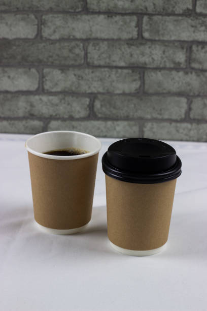 istock Brown coffee mock up on blank background for design any ideas. Paper mug cup template for cafe or restaurant create identity set. 1281167295