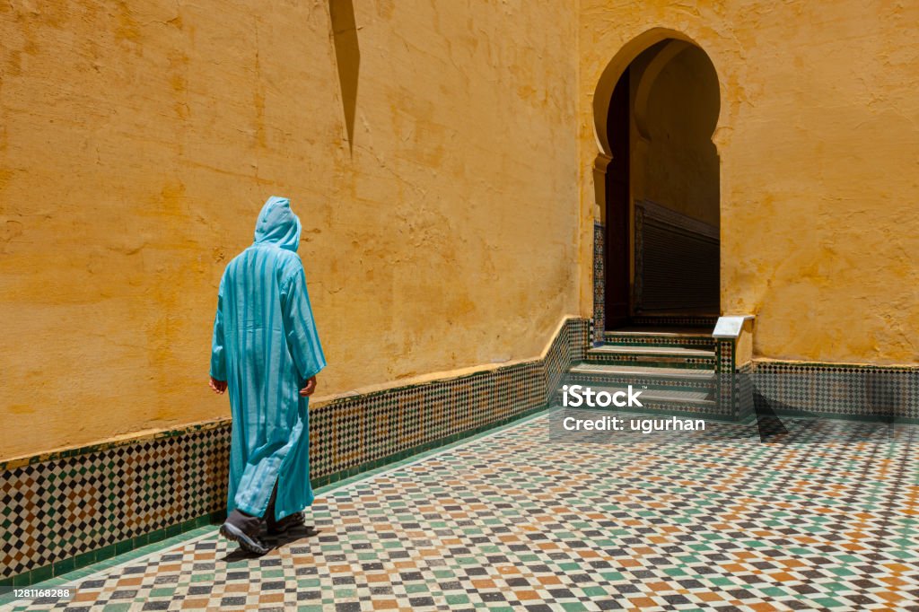 Morocco - Tomb of Moulay Ismail Yellow wall with traditional arc, Morocco, Meknes. Tomb of Moulay Ismail. Morocco Stock Photo
