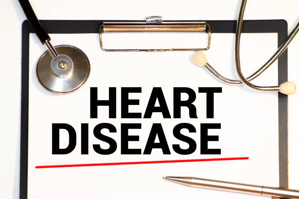istock Heart Disease - Doctor holding sign with text 1281169089