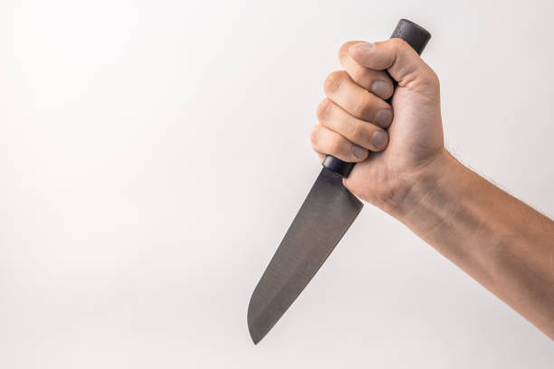 istock Big kitchen knife in man hand on white background. isolated on white background. Man threaten somebody with knife. Killer concept. Cooking equipment 1281170051