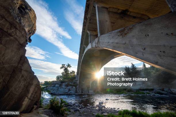 Sunrise From Under A Bridge Stock Photo - Download Image Now - Bridge - Built Structure, Nature, Stone Material
