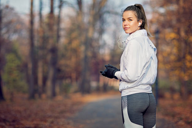 istock Runner girl is resting in a cold autumn morning 1281172713
