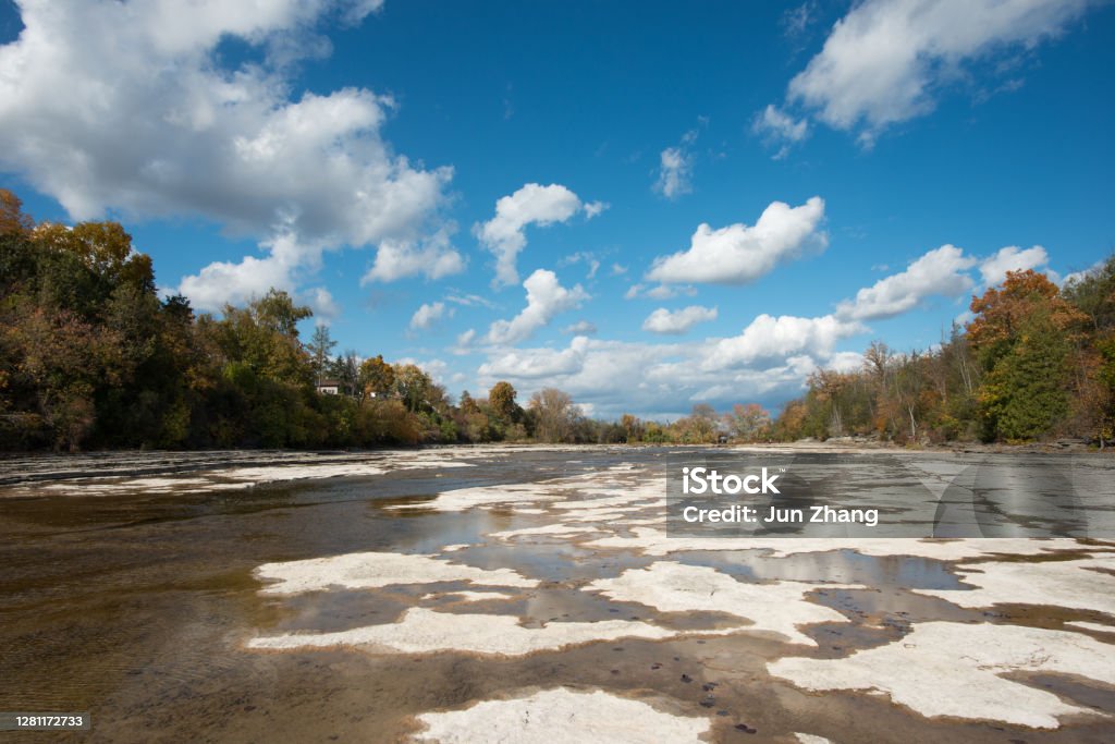 Exposed rocky river bed of Fanney Falls on Trent River, in Small town Campbellford of Canada Peaceful scene on Trent River in low water season Autumn Stock Photo