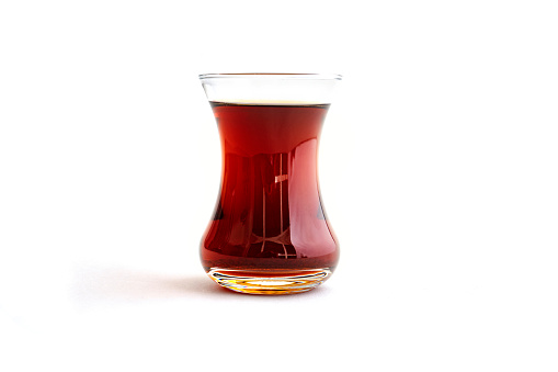 Traditional cup of turkish tea. Isolated over white background
