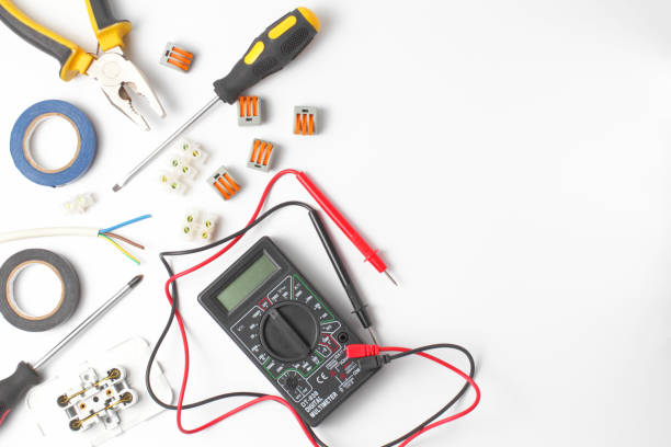 istock Electrician tools and instruments on a white background, flat lay, close-up, place for text. 1281178671