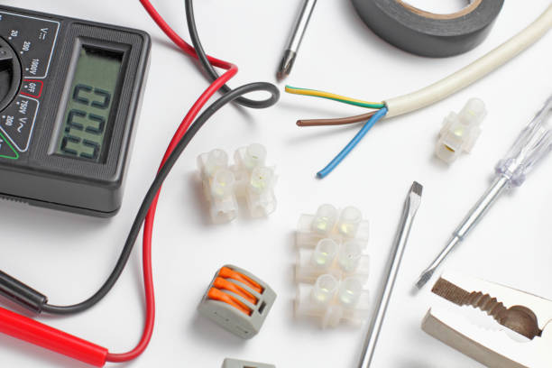 istock Electrician tools and instruments on a white background, close-up. 1281178691