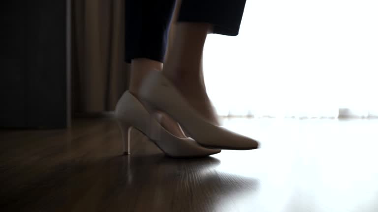 Slow motion scene of elegant business woman walking into house, Lifestyle people