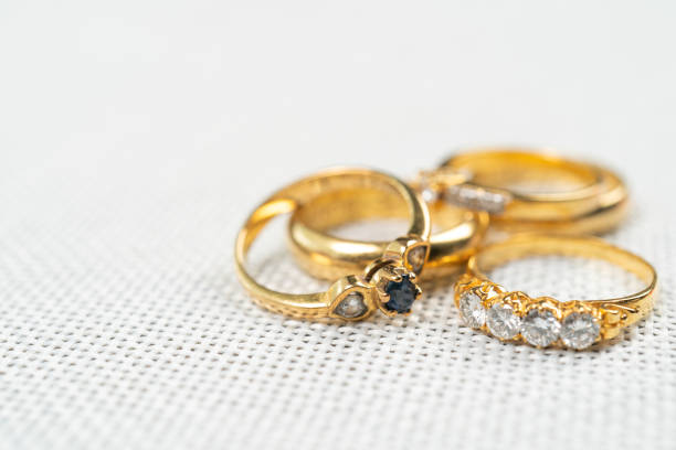 istock Group of diamond ring on white sack background. 1281192474