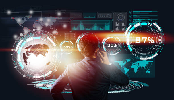 istock An energetic young businessman standing in front of a digital technology virtual screen with discuss talks via the phone. 1281196469