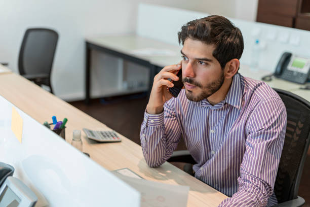 istock Man working in a coworking office during the COVID-19 pandemic 1281199230