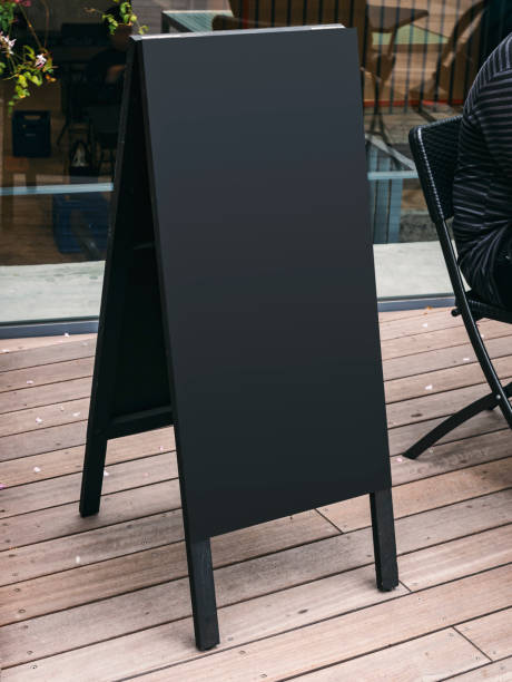 istock Mock up Blackboard sign stand Shop front menu 1281201555