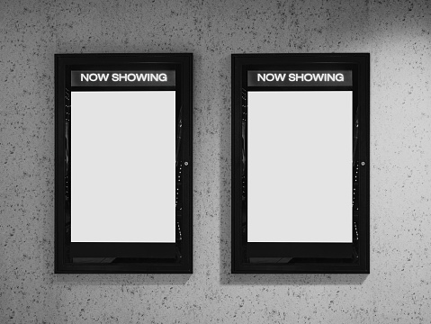 Mock up Poster frame on wall Cinema Now showing movie Poster in Movie theatre