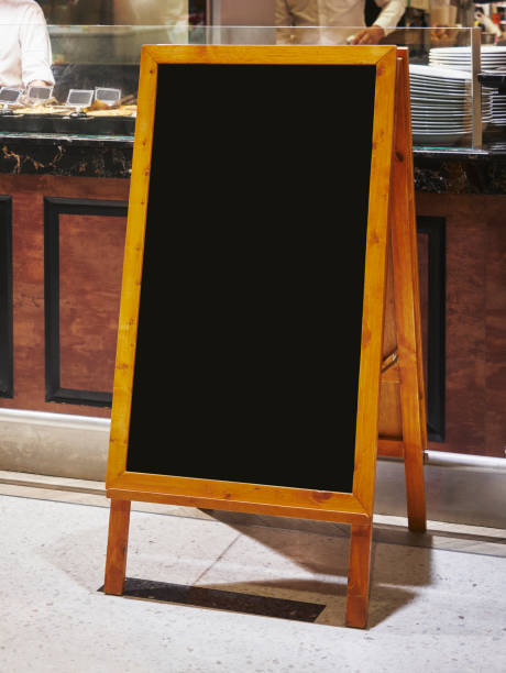 istock Mock up Chalkboard Blank Menu Sign stand Front shop Cafe 1281202299