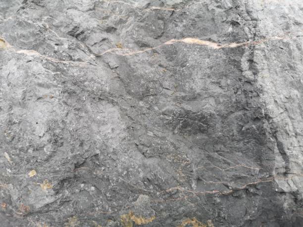 istock Natural black slate stone background pattern, surface rough texture rock material nature, Top view Copy space for text 1281203661