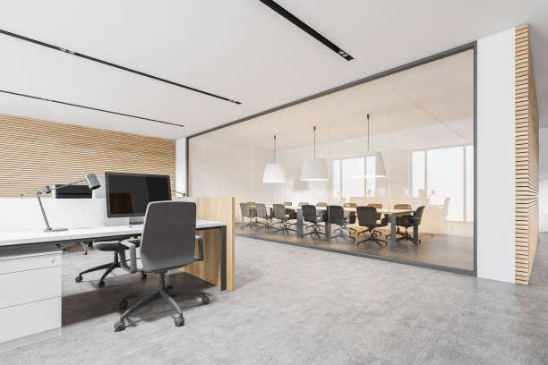 istock Modern white and wooden open space corner office and meeting room 1281208974
