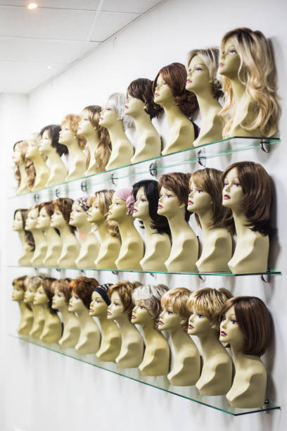istock Rows of hair wigs 1281210349