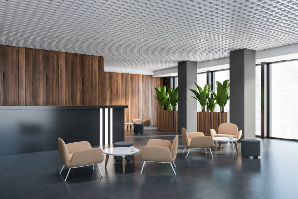 istock Grey and wooden office lounge corner 1281211307