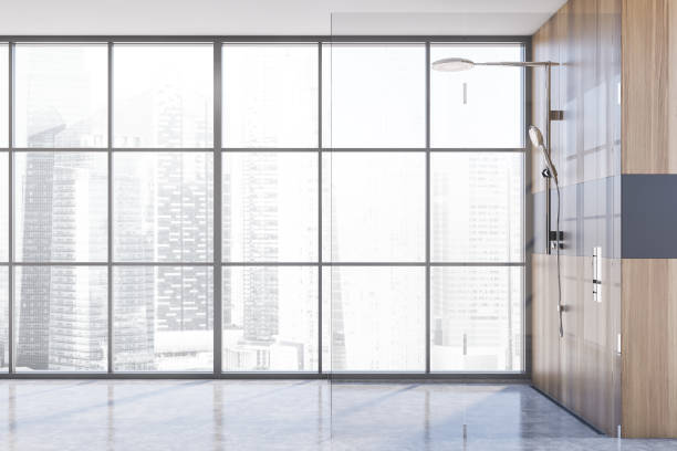 istock Wooden and gray bathroom with shower 1281211656