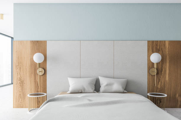 istock Modern white and wooden bedroom interior 1281211970