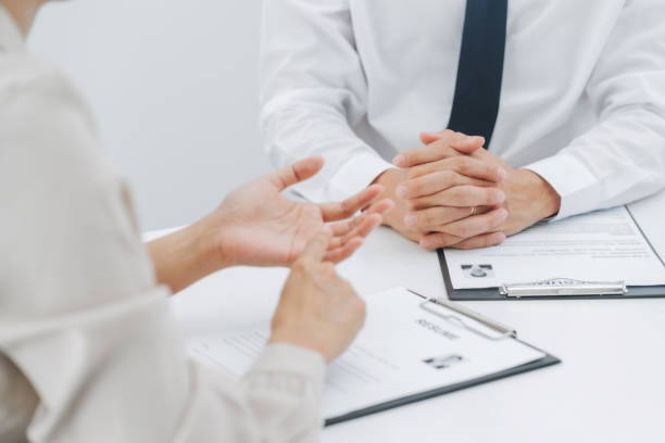 istock Job candidate with resume job interview to human resource manager. 1281213048