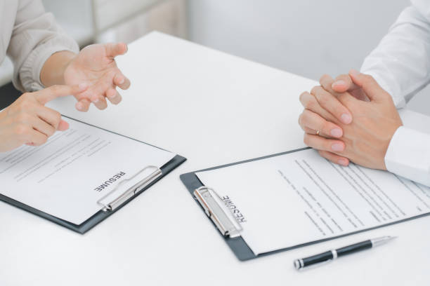 istock Job candidate with resume job interview to human resource manager. 1281213057