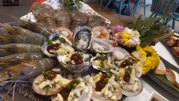 istock Buffet fresh sashimi seafood, shrimp, oyster, and salmon 1281214334