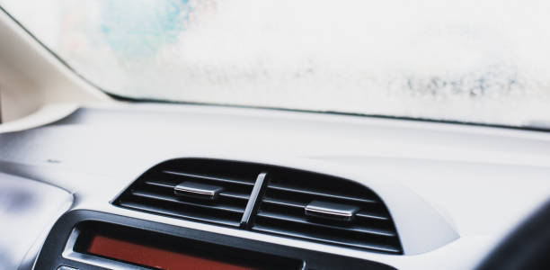 istock Air conditioning in a car prevents windows from steaming when it is raining 1281214570