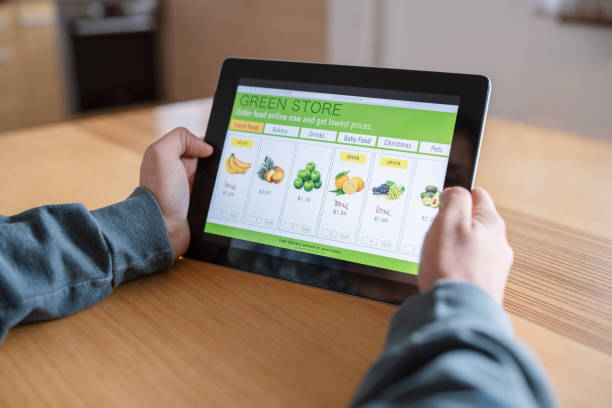istock Woman ordering fruits and vegetables online 1281215569