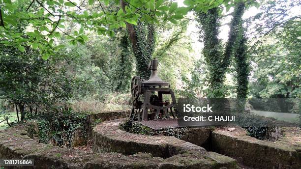 The Diabolic Devil Garden And His Old Viewable Equipment Stock Photo - Download Image Now