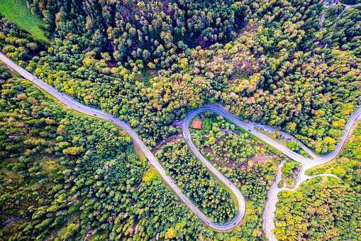 Kesselberg Passroad at a Mountain Peak in Bavaria. Autumn Aerial Drone Shot from above. Lake Walchensee