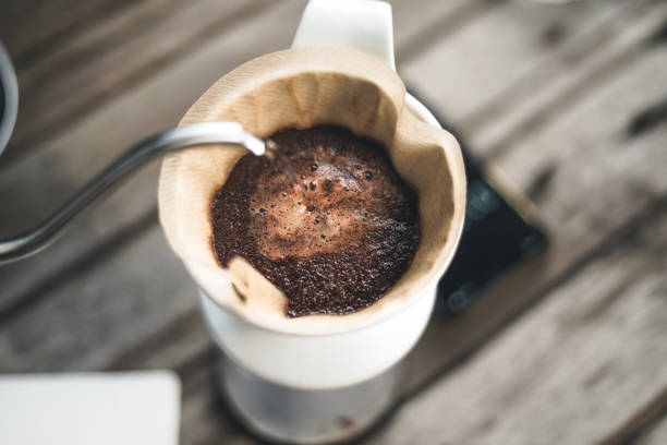istock barista dripping coffee and slow coffee bar style drip coffee 1281222690